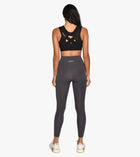Top esportivo postural feminino pullover preto — vista de costas de corpo inteiro — Alignmed Brasil